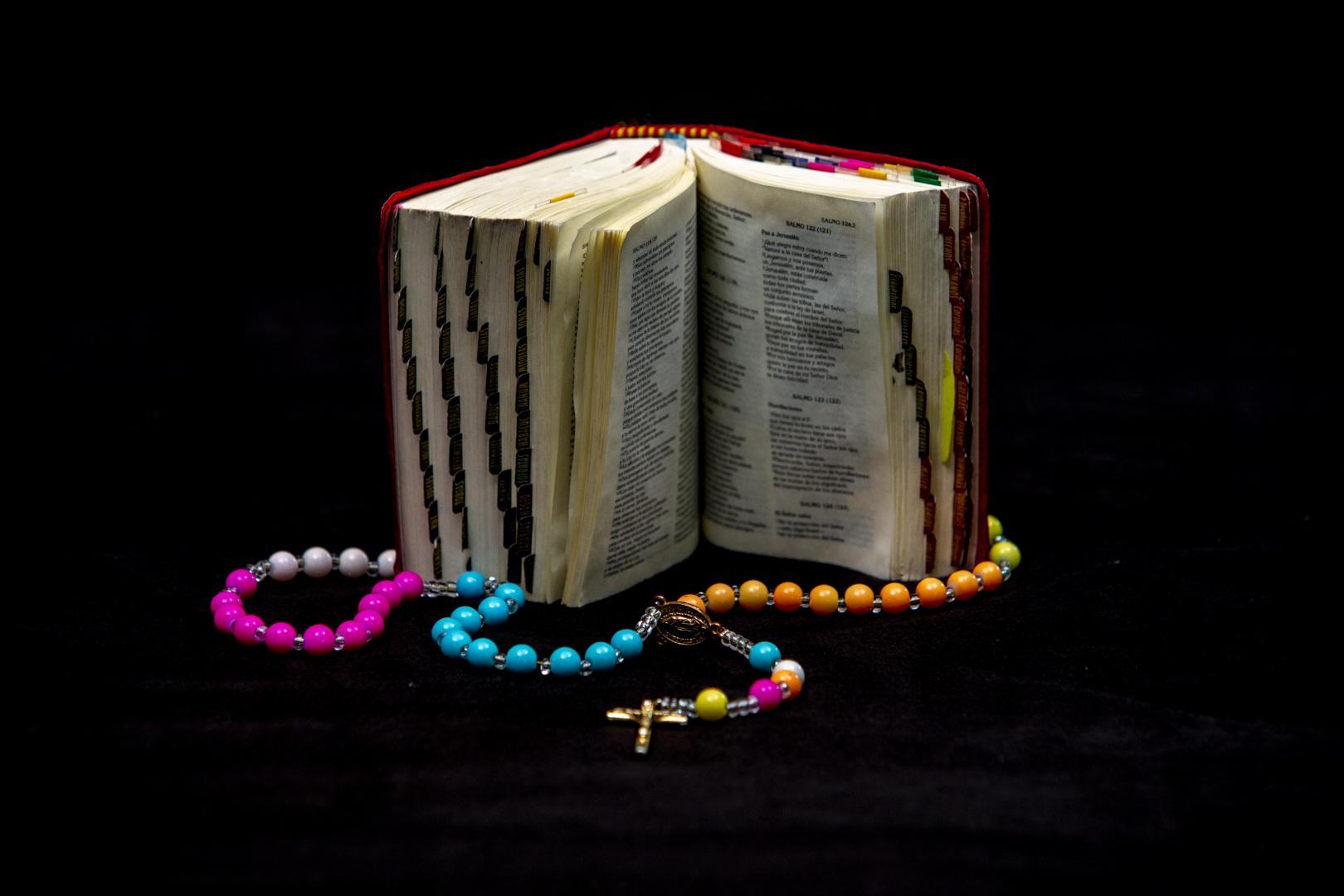 The Bible and the rosary treasured by María.